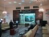 Inside the main manda of Baghdad, Iraq: The congregation hall with the altar depicting the baptism motif, John the Baptist in the Jordan River.