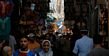 Crowds in the narrow Rue Jamaa Zitouna.